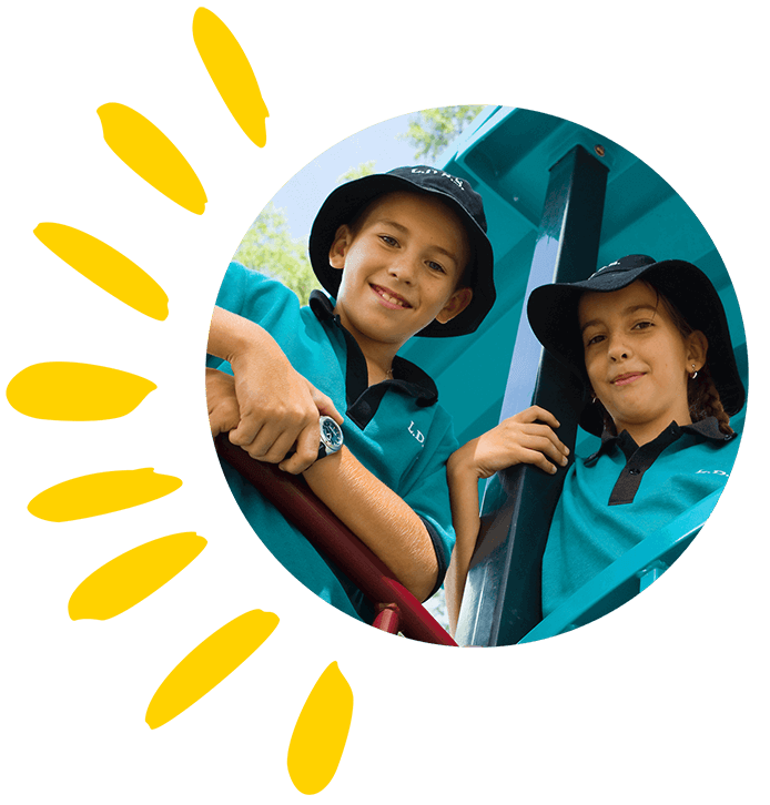 Children in a playground protecting themselves from the sun